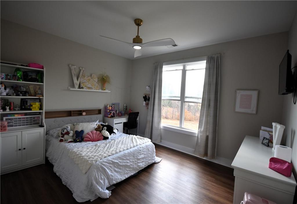 533 Lively Road Waco, GA 30182 - Photo 19 of 41 a bed room with furniture and a window