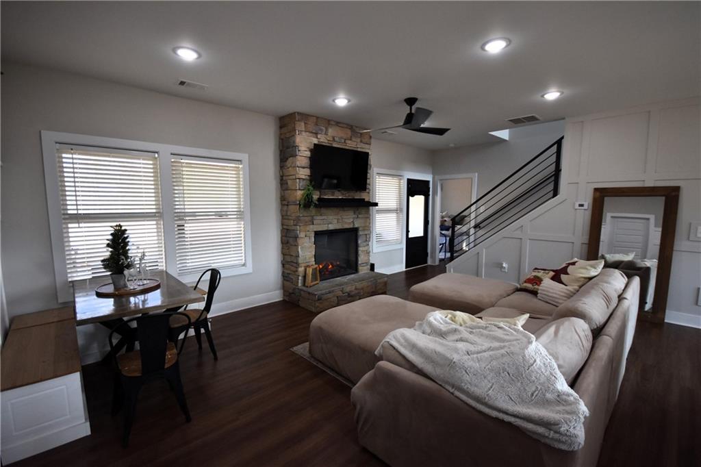 533 Lively Road Waco, GA 30182 - Photo 24 of 41 a living room with furniture a flat screen tv and a fireplace