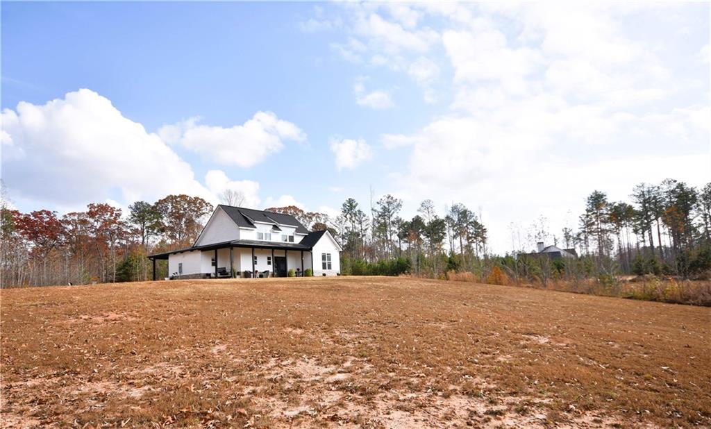 533 Lively Road Waco, GA 30182 - Photo 3 of 41 a view of house with outdoor space