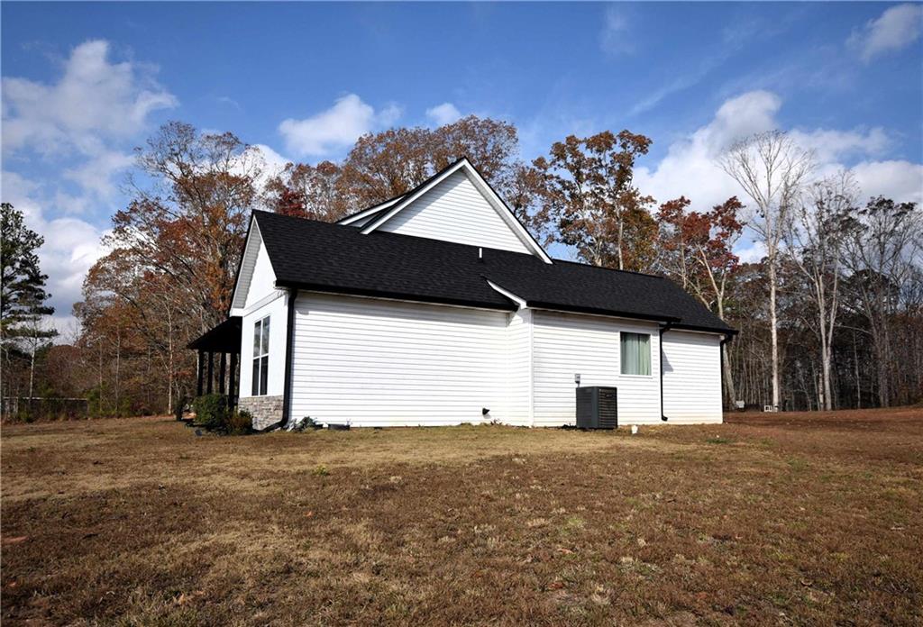 533 Lively Road Waco, GA 30182 - Photo 7 of 41 a house view with a outdoor space