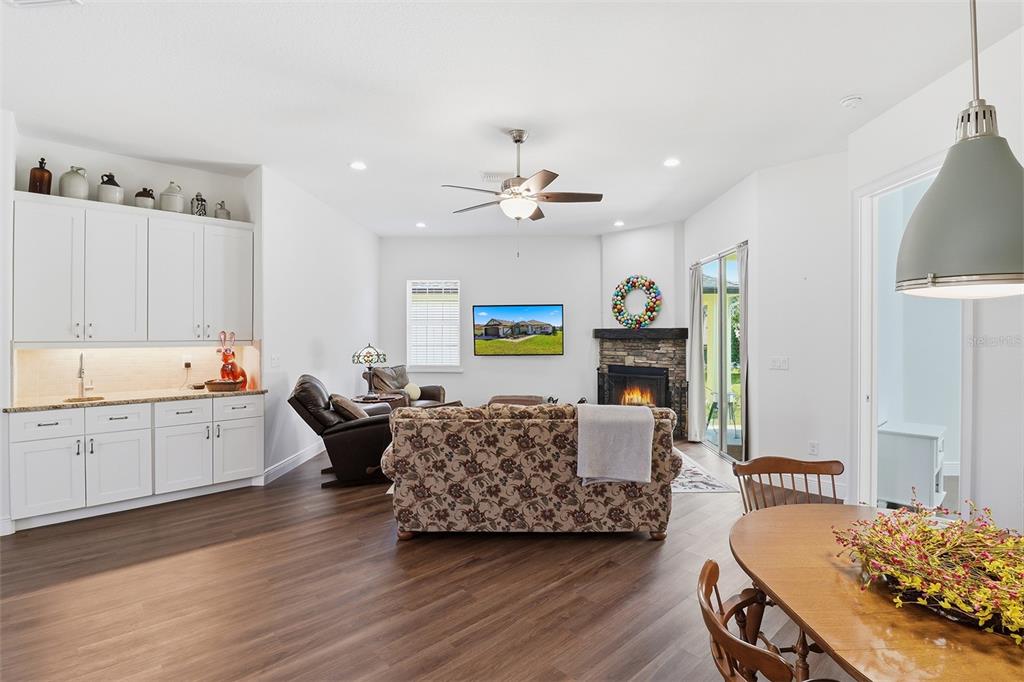 5470 West Hunter Run Lane Homosassa, FL 34446 - Photo 15 of 46 a living room with furniture and a fireplace