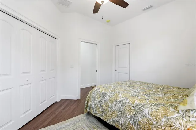 a bedroom with a bed and painted walls