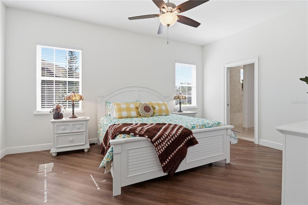 5470 West Hunter Run Lane Homosassa, FL 34446 - Photo 28 of 46 a bedroom with a bed and a window