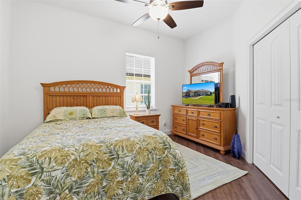 5470 West Hunter Run Lane Homosassa, FL 34446 - Photo 32 of 46 a bedroom with a bed and a dresser in it