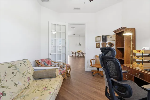 a bedroom with a bed and a couch