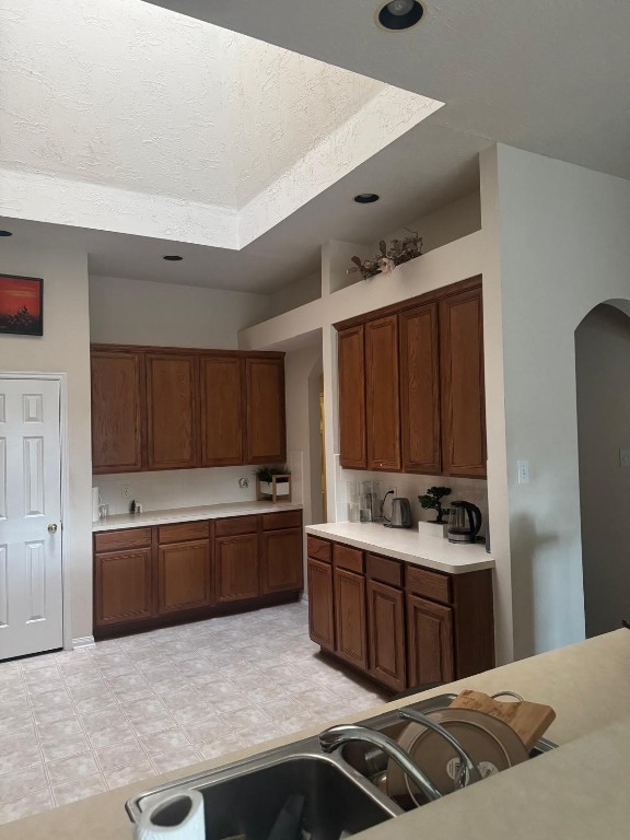 11126 Riverbank Ridge Lane Houston, TX 77089 - Photo 7 of 8 a kitchen with stainless steel appliances kitchen island granite countertop a sink stove and refrigerator