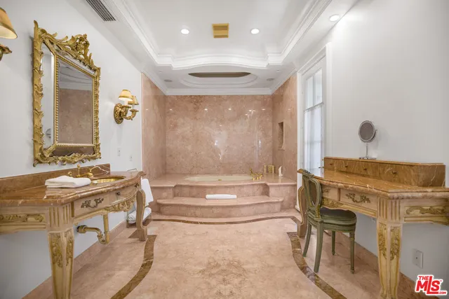 a bathroom with a toilet and a sink