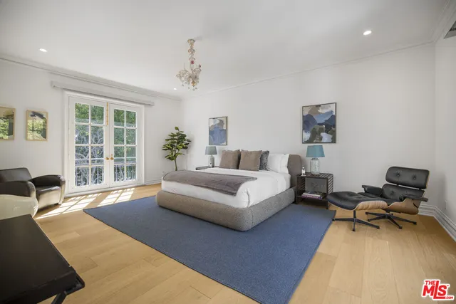 a bathroom with a toilet a sink and a shower