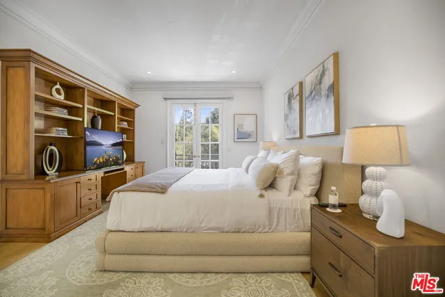 a kitchen with granite countertop white cabinets and appliances