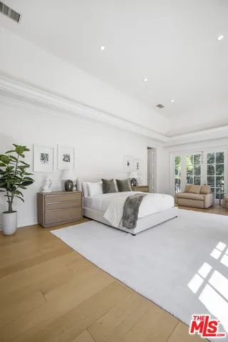 a view of a brick building next to a road