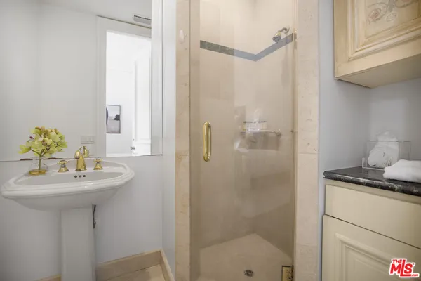 a living room with stainless steel appliances granite countertop furniture and a living room view