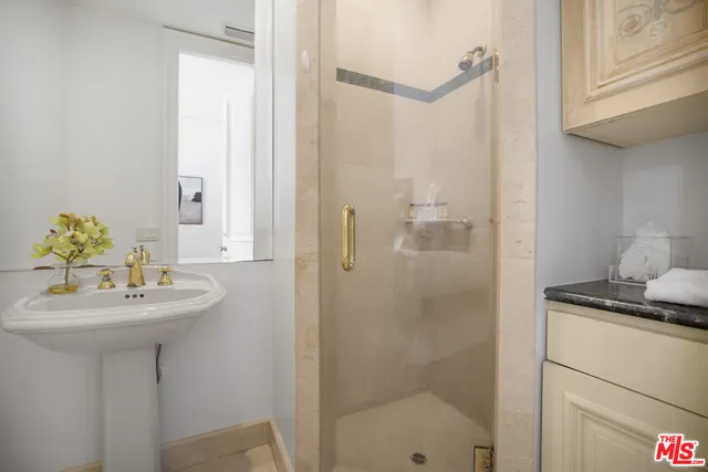 a living room with stainless steel appliances granite countertop furniture and a living room view