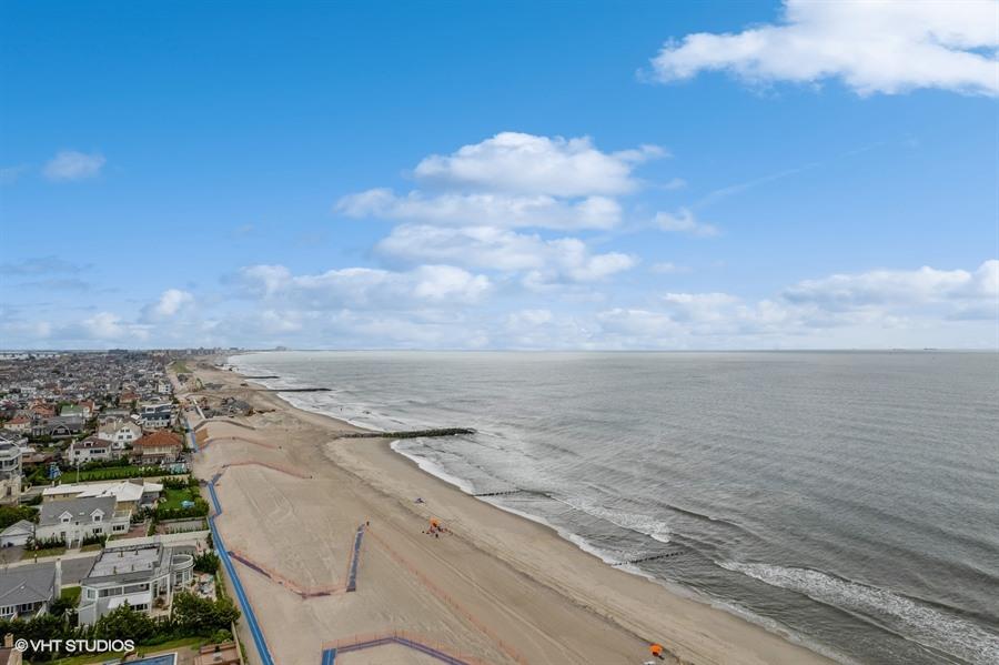128-11 Newport Avenue, Unit 4A Queens, NY 11694 - Photo 16 of 18 Water view featuring nearby beach