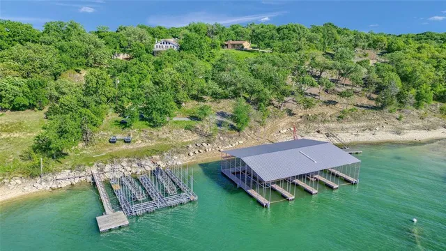 a view of a two chairs in a yard