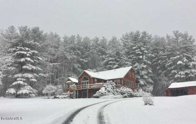 3025 Mt Anthony Road Bennington, VT 05201 - Photo 1 of 54 a view of a house with a yard covered in snow