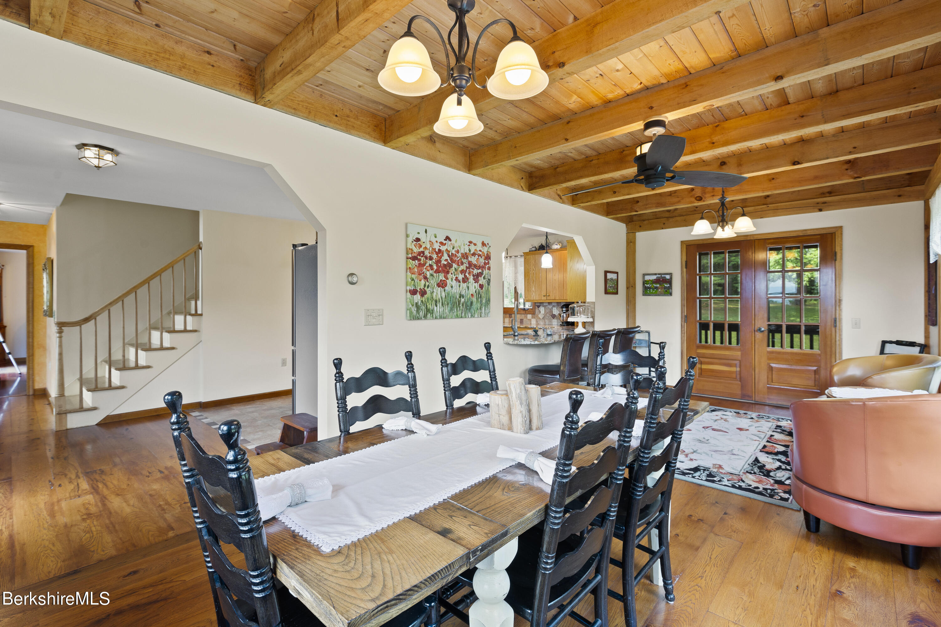 3025 Mt Anthony Road Bennington, VT 05201 - Photo 29 of 54 a view of a dining room with furniture and wooden floor