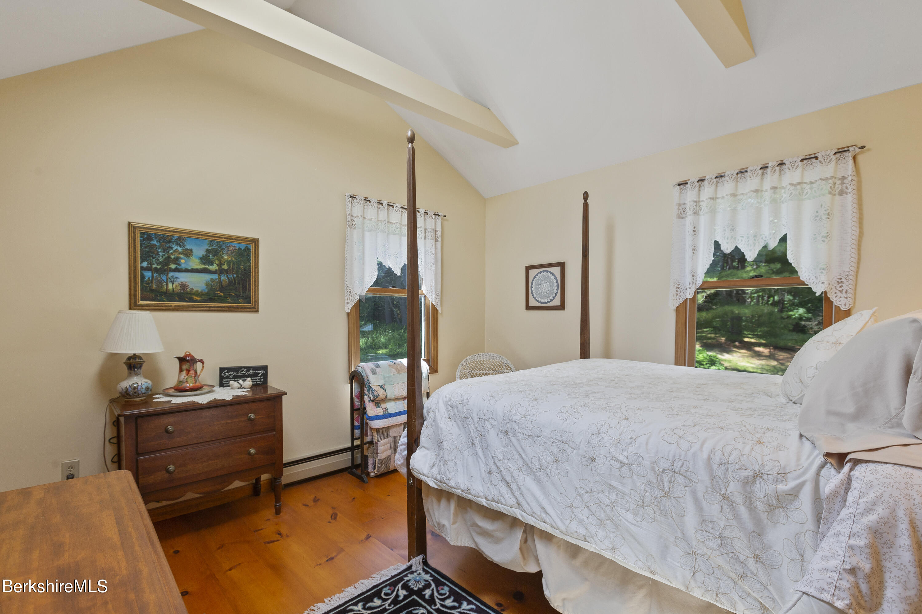 3025 Mt Anthony Road Bennington, VT 05201 - Photo 40 of 54 a bedroom with a bed and a dresser