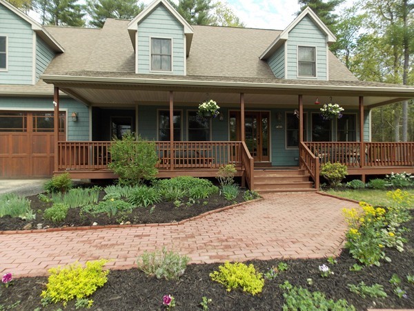74 Monson Road Brimfield, MA 01010 - Photo 26 of 29 a front view of a house with garden