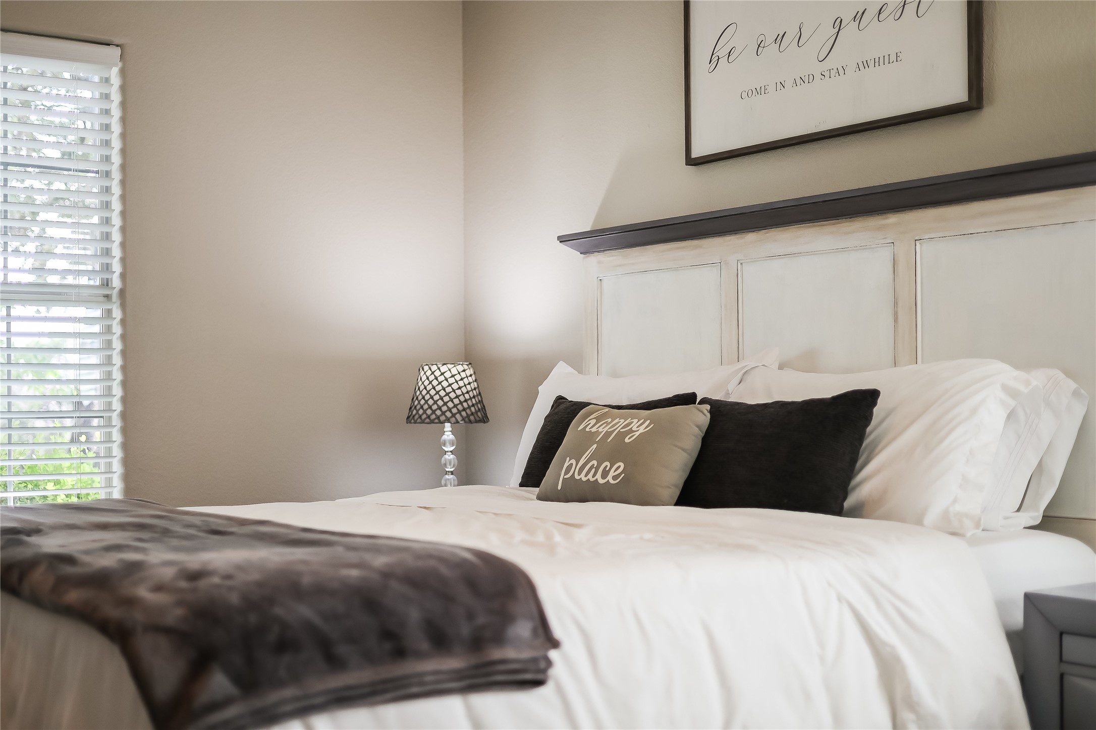 426 Summit Ridge Drive North Point Venture, TX 78645 - Photo 17 of 28 a bedroom with a bed and window