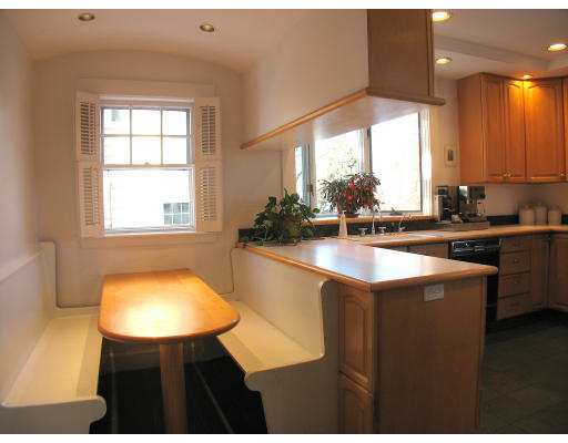 78 Watson Road Belmont, MA 02478 - Photo 7 of 14 a kitchen with a sink cabinets and a large window