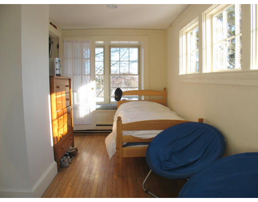 78 Watson Road Belmont, MA 02478 - Photo 10 of 14 a bedroom with a bed and wooden floor