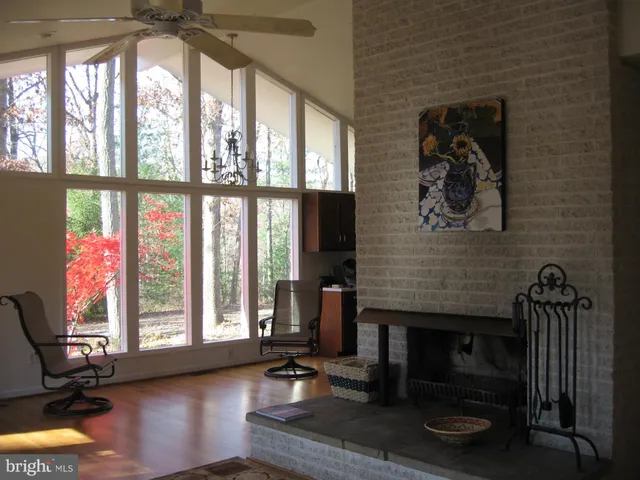 a room with gym equipment and a floor to ceiling window