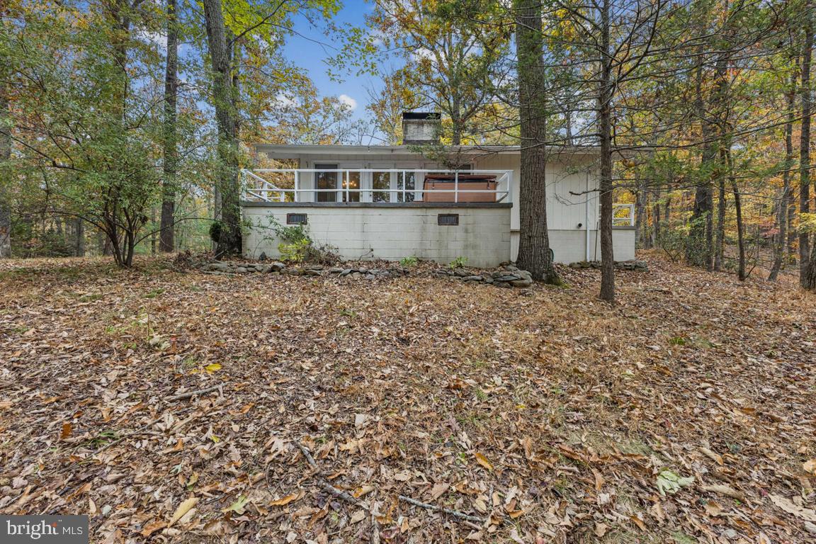 135 Lizzie Mills Road Castleton, VA 22716 - Photo 30 of 33 a view of a house with a yard