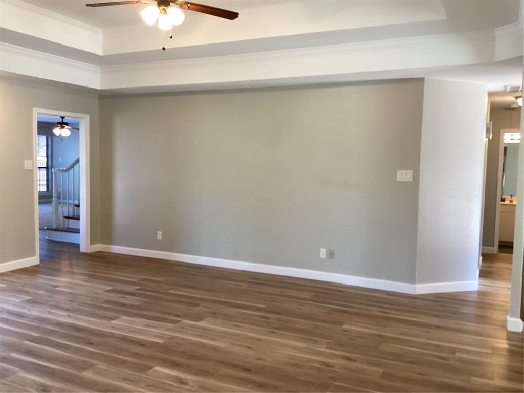 485 Cherokee Trail Keller, TX 76248 - Photo 17 of 33 a view of an empty room with wooden floor