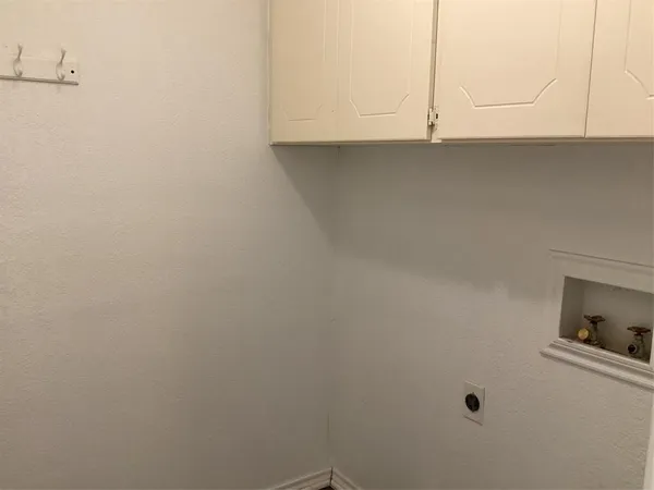 a view of kitchen and microwave