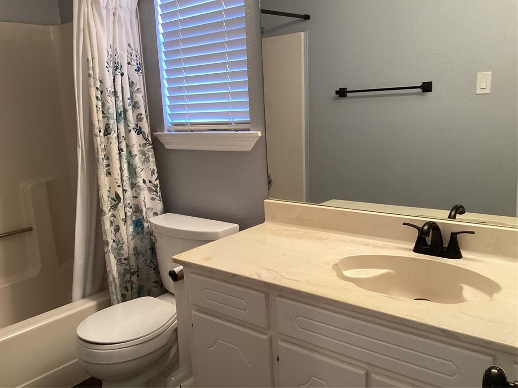 485 Cherokee Trail Keller, TX 76248 - Photo 27 of 33 a bathroom with a sink and toilet
