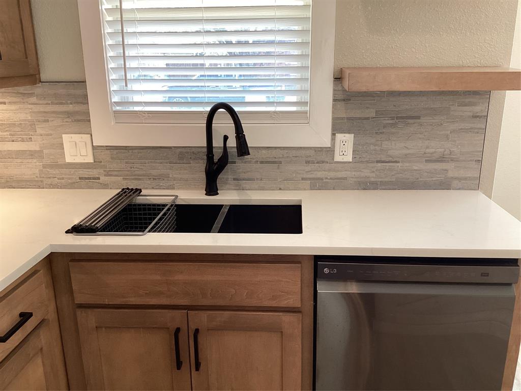 485 Cherokee Trail Keller, TX 76248 - Photo 6 of 33 a close view of sink and tap