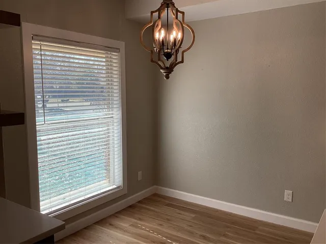 a view of a livingroom with a window