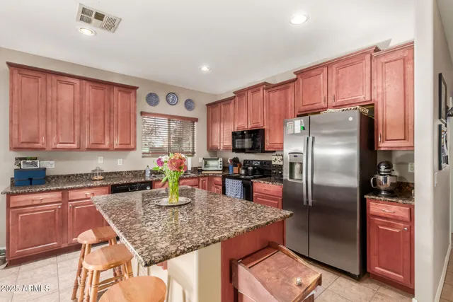 a bathroom with a sink double vanity and a mirror