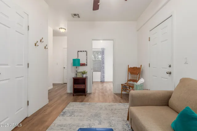 a bedroom with a bed and a dresser