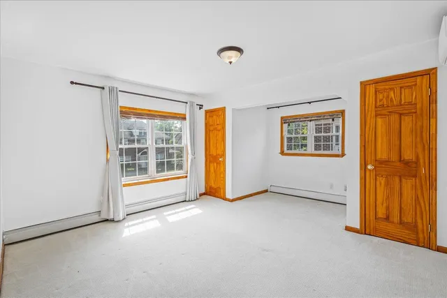 an empty room with windows