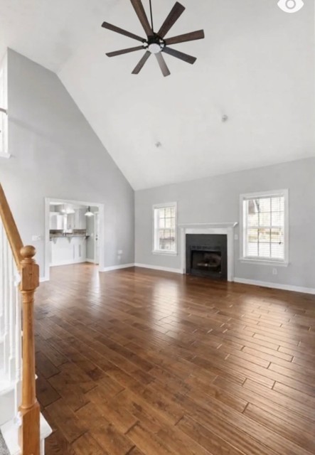 6502 Franklin Road Murfreesboro, TN 37128 - Photo 17 of 36 an empty room with windows and fireplace