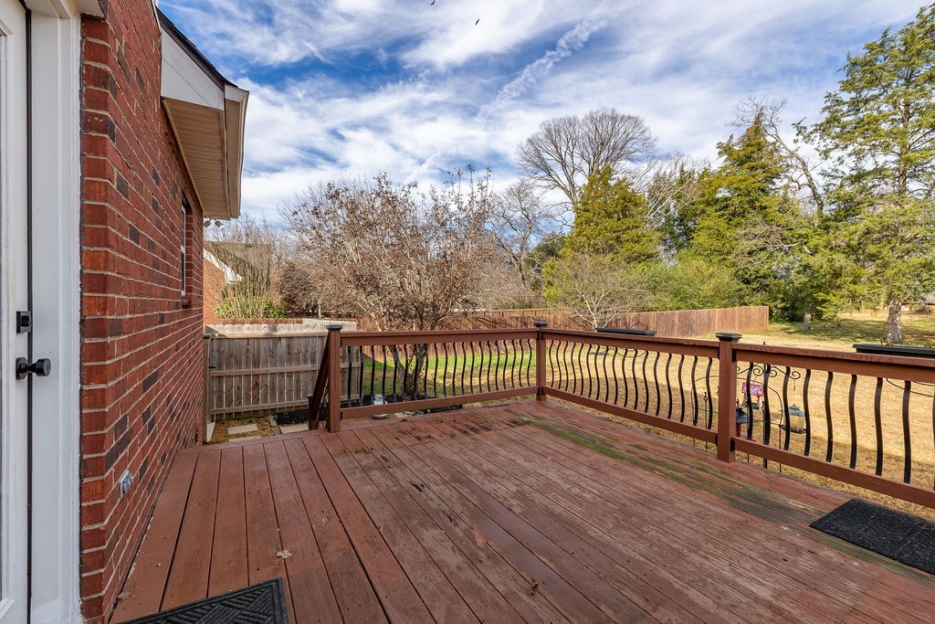 6502 Franklin Road Murfreesboro, TN 37128 - Photo 32 of 36 a view of a balcony with wooden floor