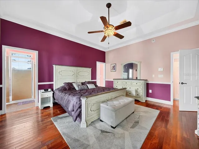 a spacious bathroom with a double vanity sink a mirror and a shower