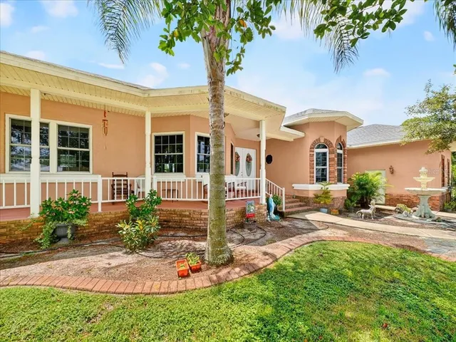 a front view of a house with a porch