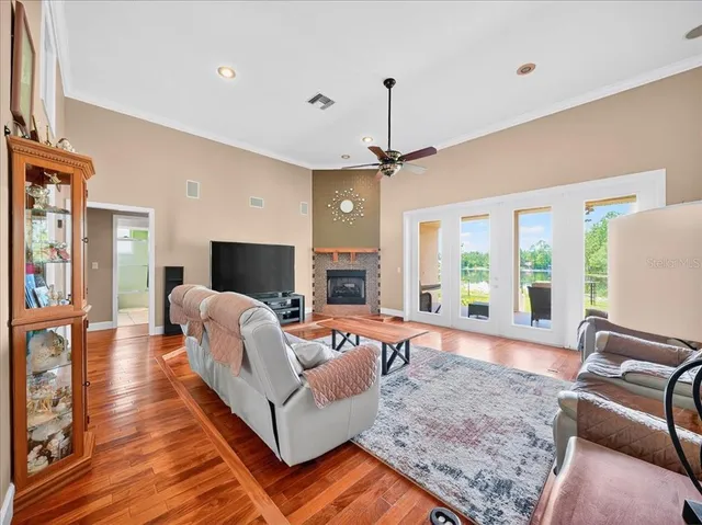 a living room with furniture or couch and a dining table