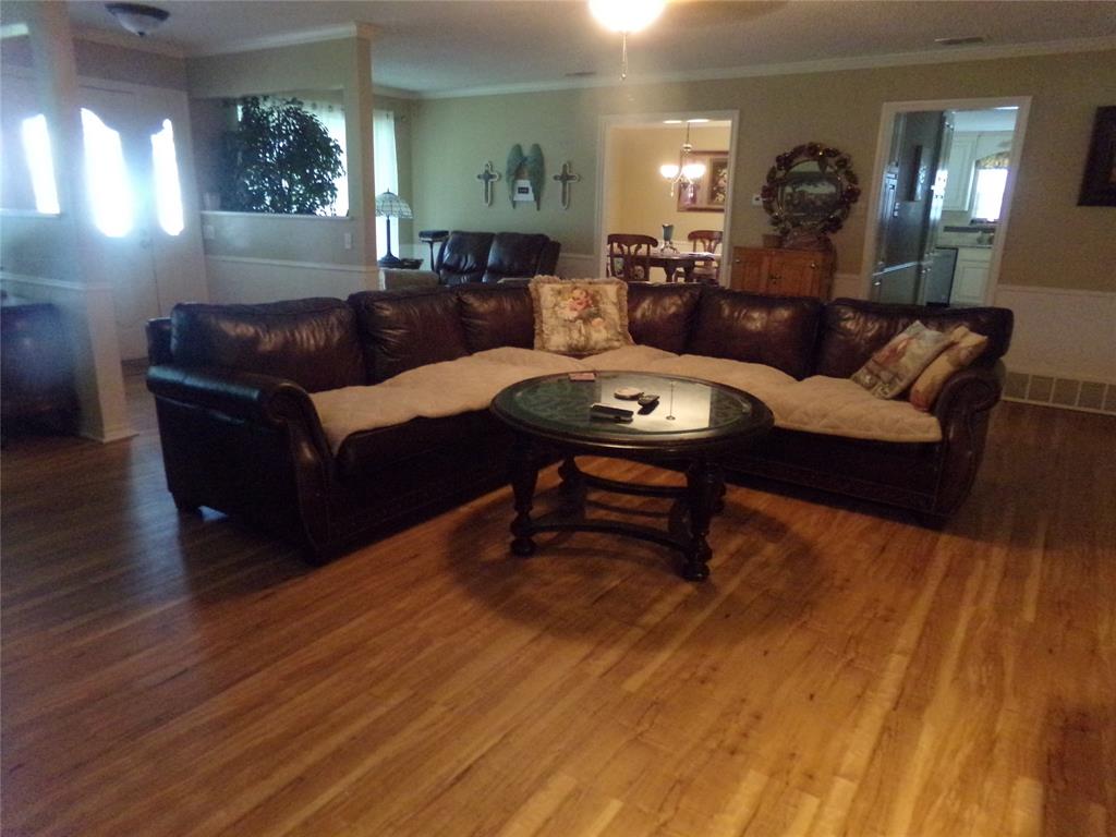 5110 Wedgefield Road Granbury, TX 76049 - Photo 6 of 23 Hardwood-style flooring extends throughout this living area