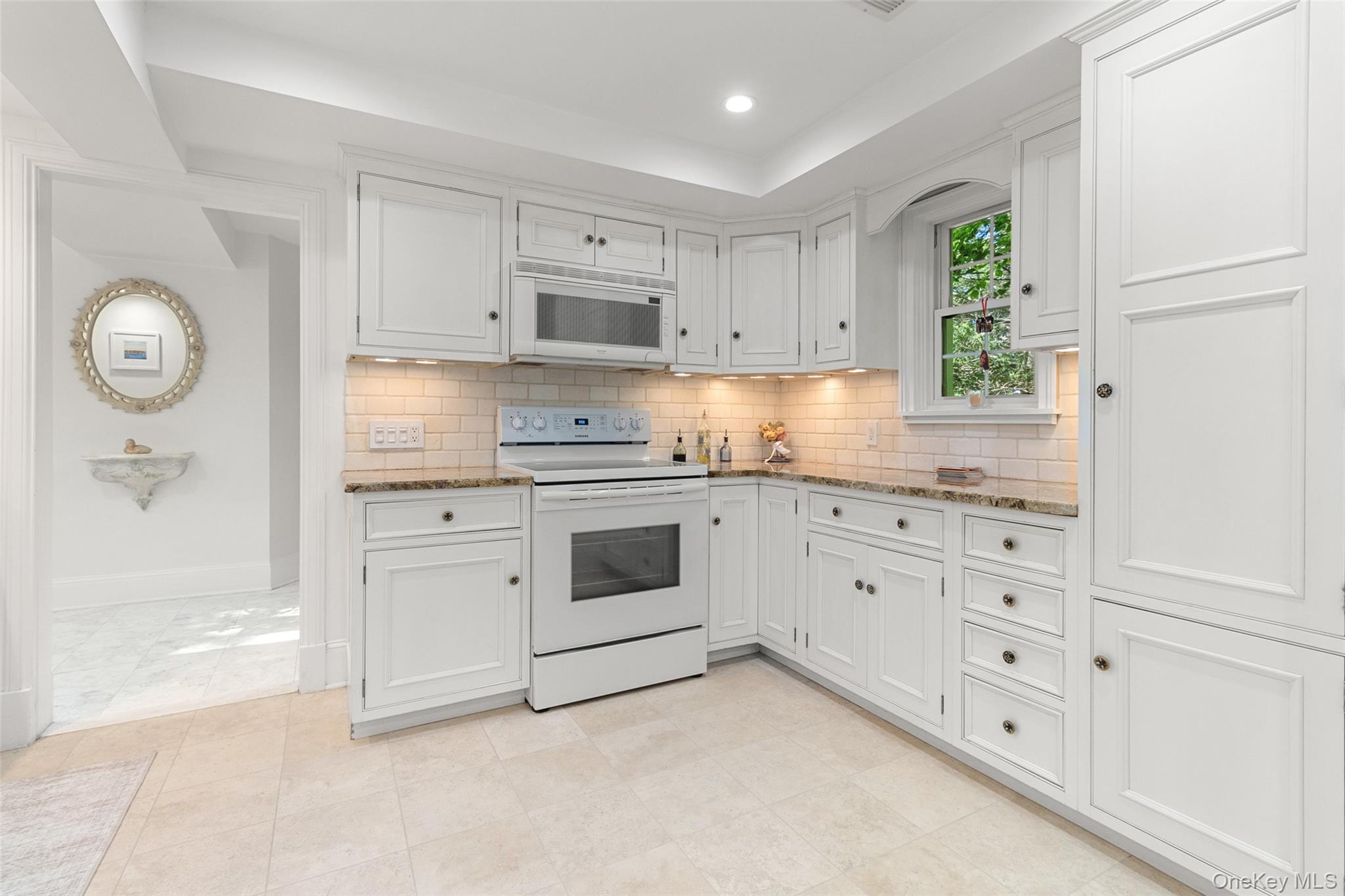 8 Rock Hill Road Mahopac, NY 10541 - Photo 11 of 50 Modern kitchen, high end cabinetry, granite cabinets, stone splash back, travertine floors