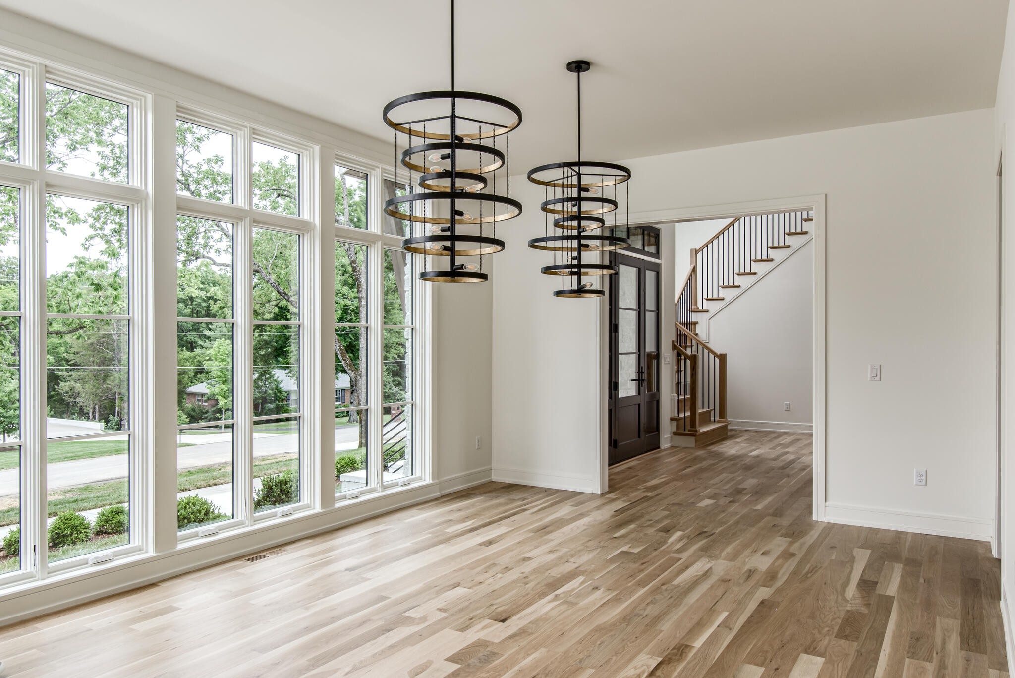 1401 Burton Valley Road Nashville, TN 37215 - Photo 11 of 68 a view of empty room with wooden floor and fan