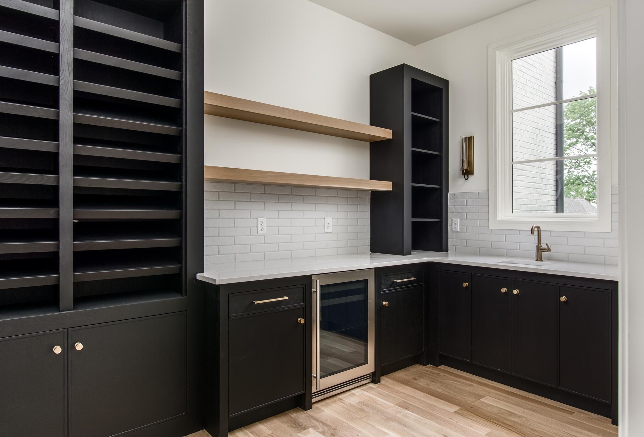 1401 Burton Valley Road Nashville, TN 37215 - Photo 12 of 68 a kitchen with a sink and cabinets