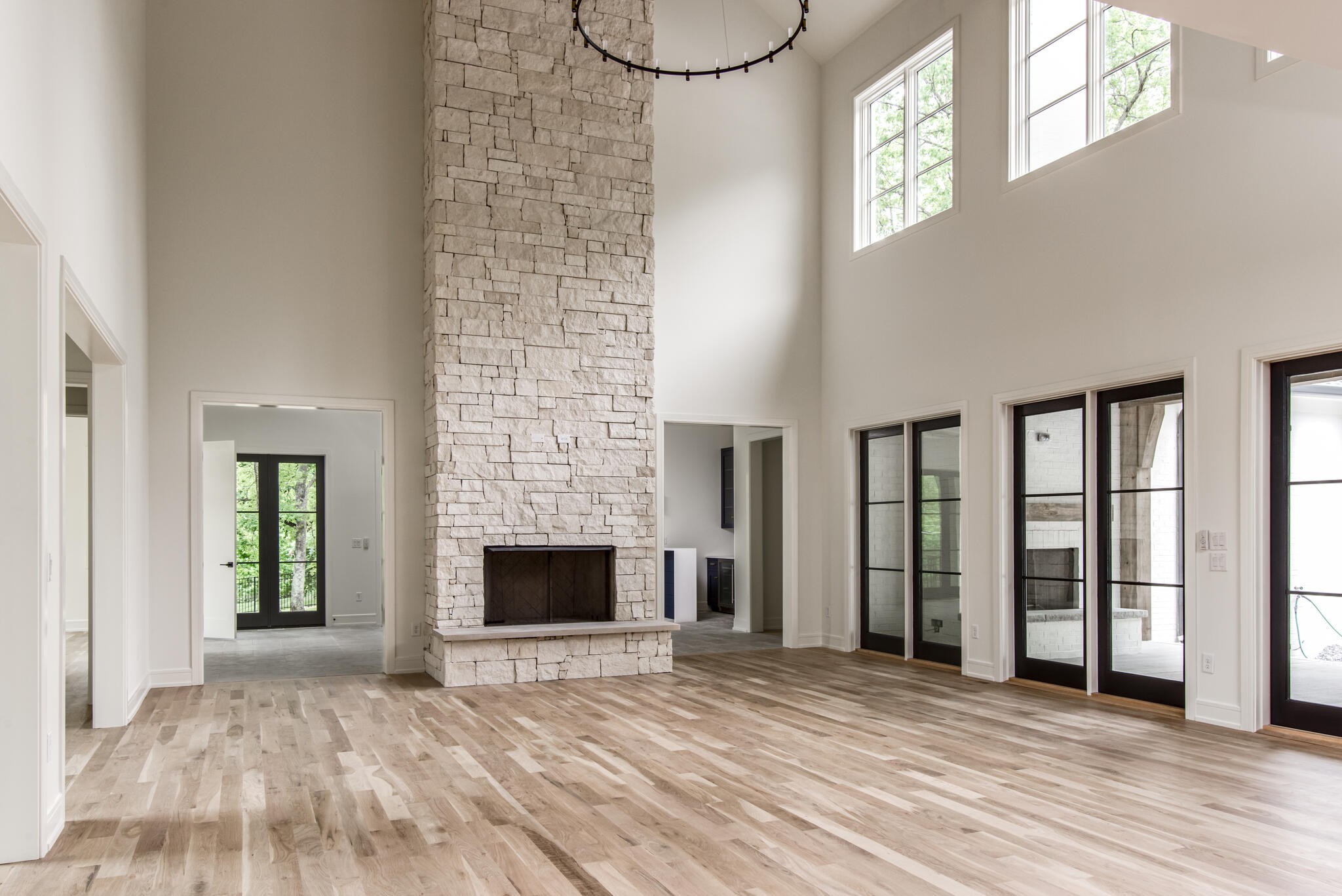 1401 Burton Valley Road Nashville, TN 37215 - Photo 18 of 68 a view of an empty room with window and wooden floor