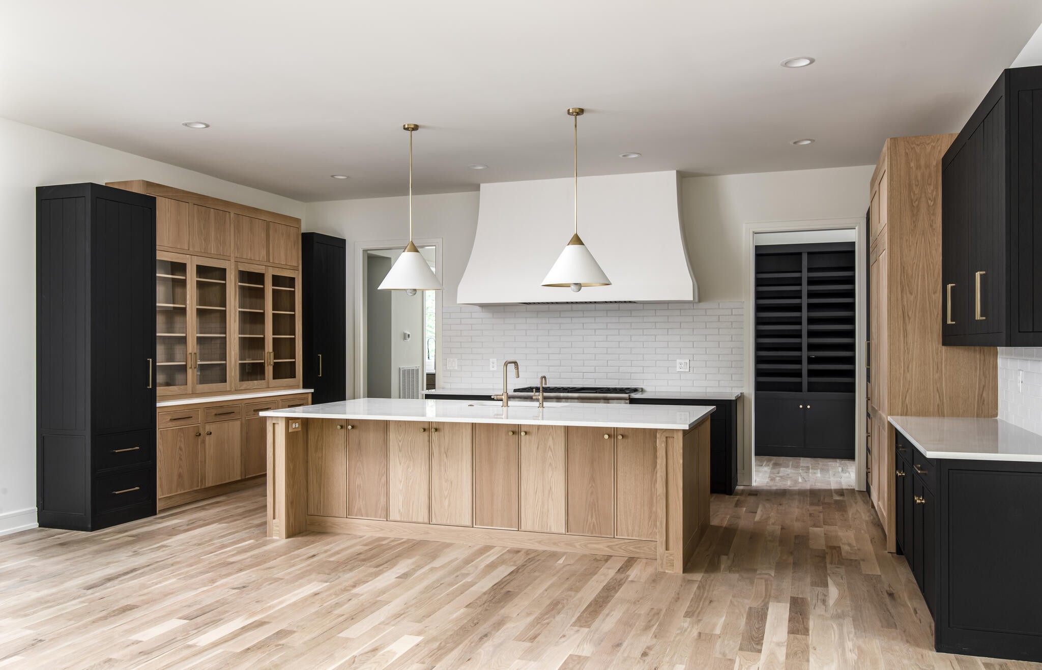 1401 Burton Valley Road Nashville, TN 37215 - Photo 22 of 68 a kitchen with stainless steel appliances granite countertop a stove a sink and a refrigerator