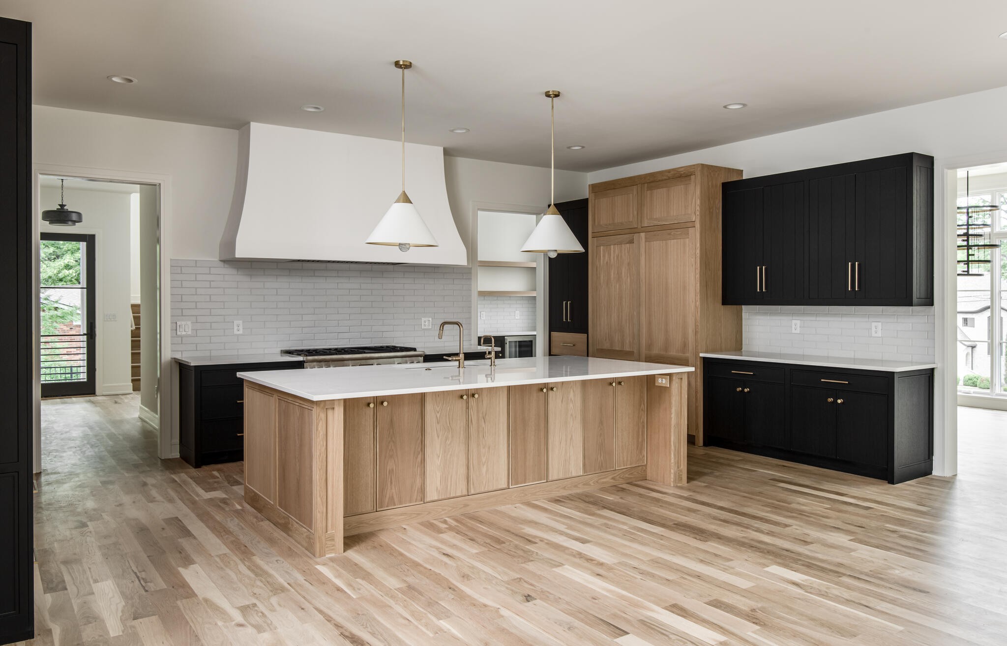 1401 Burton Valley Road Nashville, TN 37215 - Photo 23 of 68 a large kitchen with stainless steel appliances granite countertop a stove a sink and a refrigerator