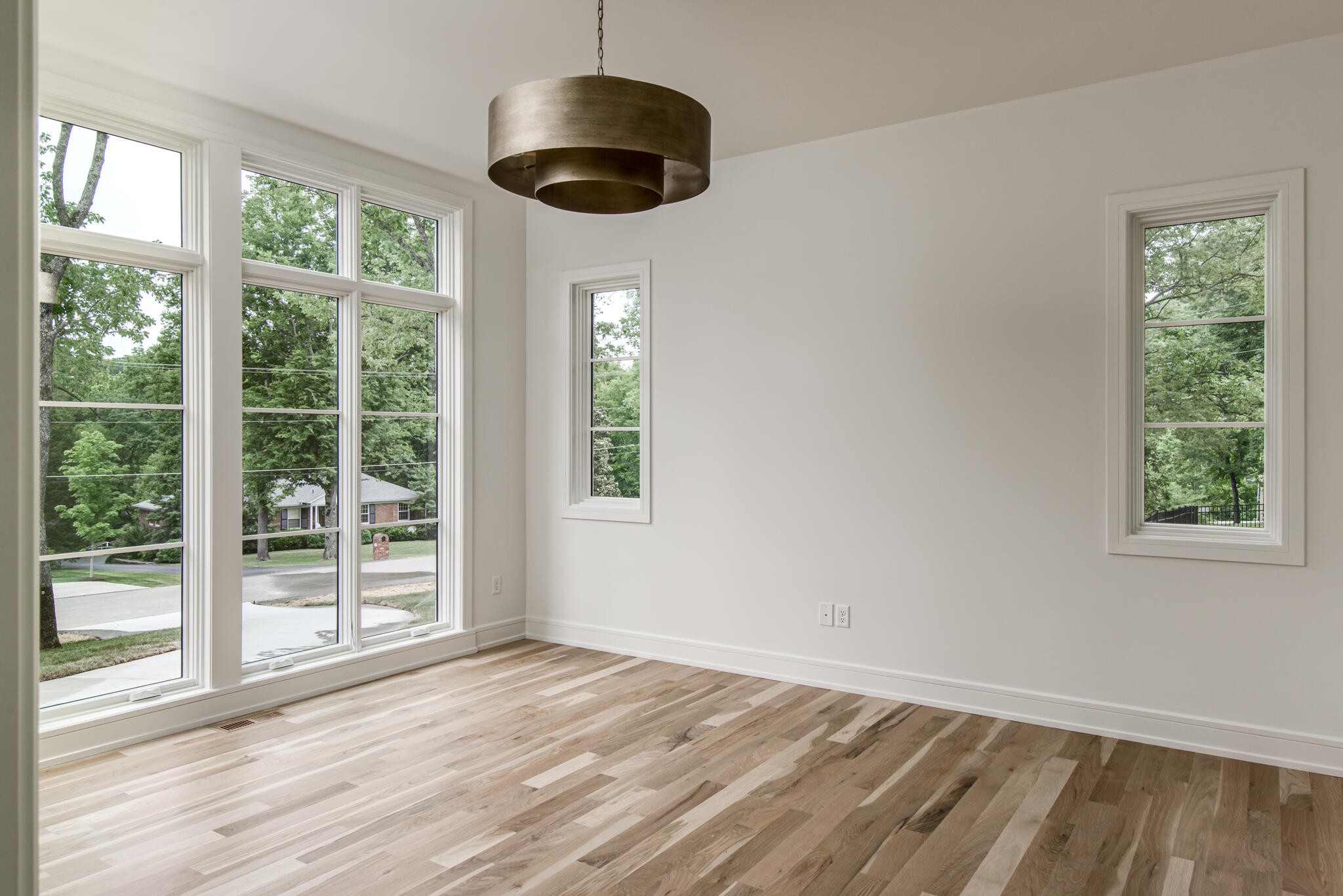 1401 Burton Valley Road Nashville, TN 37215 - Photo 27 of 68 a view of an empty room with wooden floor and a window