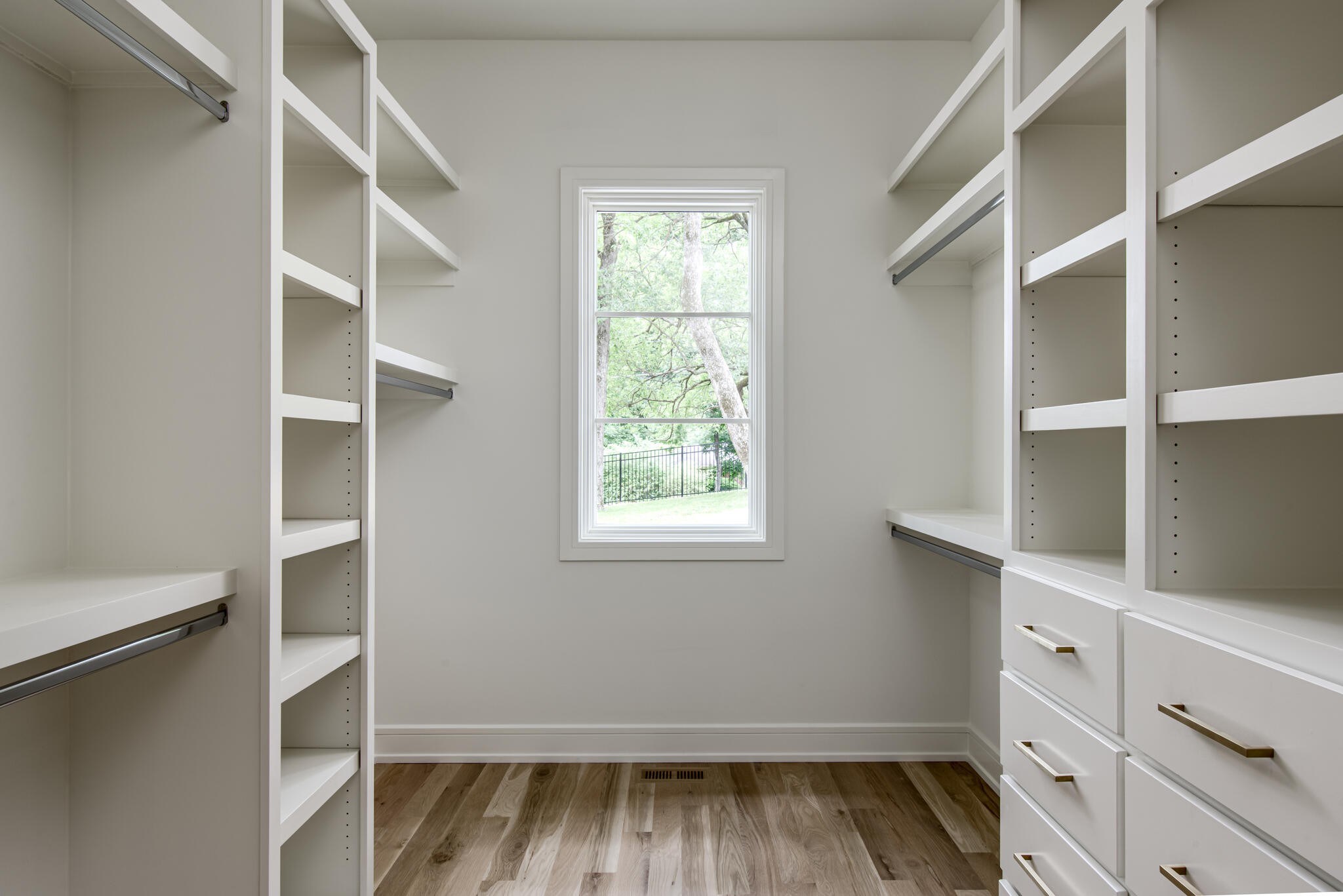 1401 Burton Valley Road Nashville, TN 37215 - Photo 35 of 68 a view of walk in closet with empty racks