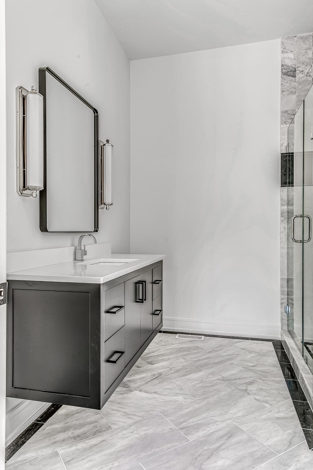 1401 Burton Valley Road Nashville, TN 37215 - Photo 39 of 68 a bathroom with a sink and a mirror